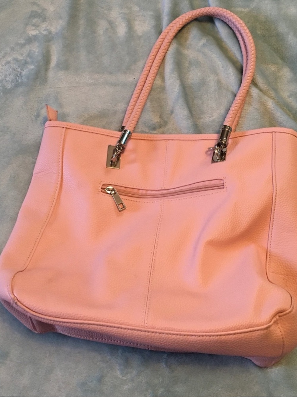 Large pink leather purse.